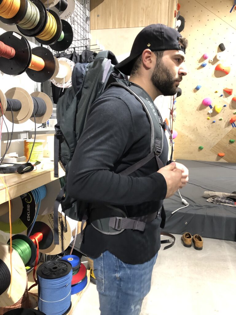 man wearing hiking backpack
