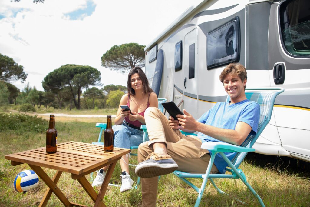 couple camping at trailer